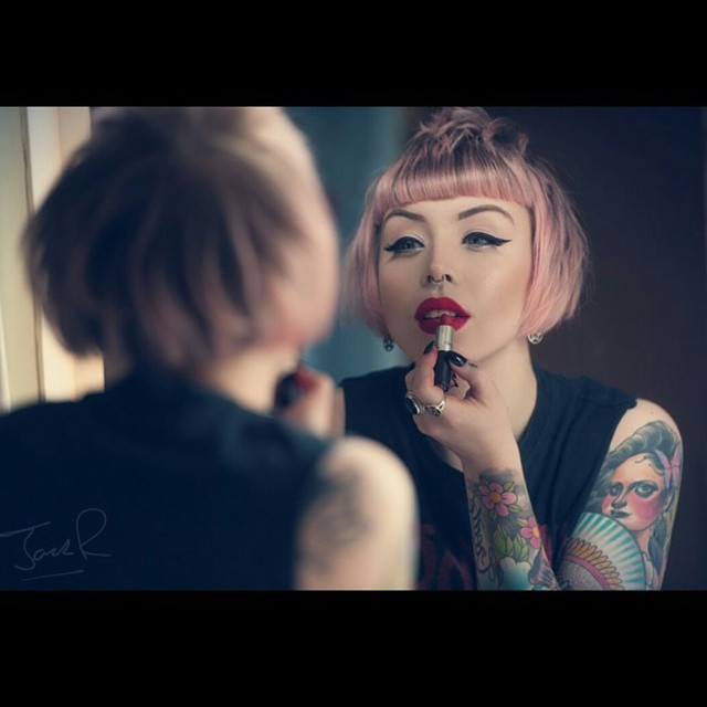 justsaveyourscissors:  I love a red lip. And jack loves taking photos of me fixing