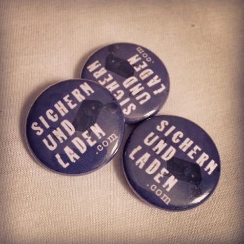 Big blast from the past: was clearing out a cocktail purse this morning and found these button badges from when we took B.J. Fletcher: Private Eye to the Gay Games in Cologne in 2010 with @afterellen! #lockandload