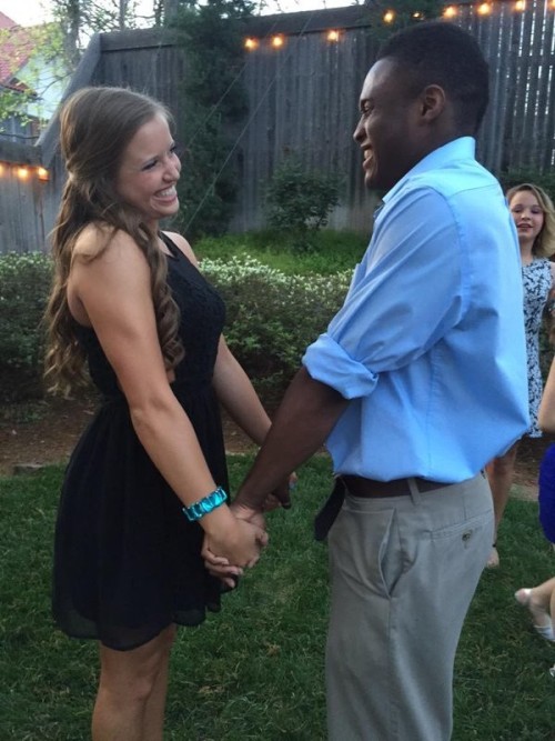 A young happy interracial couple!Find your interracial joy today!