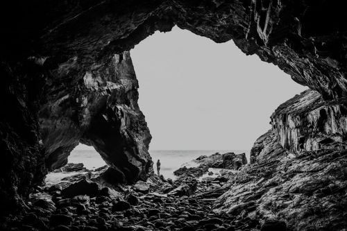 The beautiful @louna_sea dwarfed in this fabulous sea cave at Noosa National Park from our shoot in 