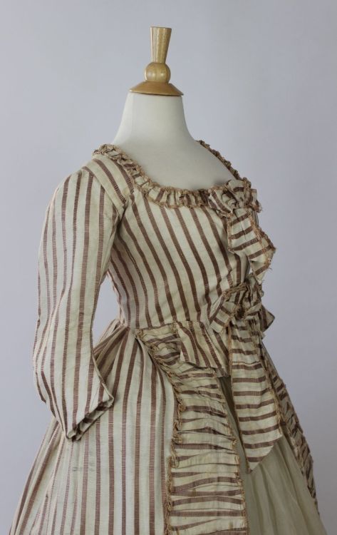 Striped 18th Century Robe in Silk and Cotton with Self Fabric Ruching and BowsI’m going to say