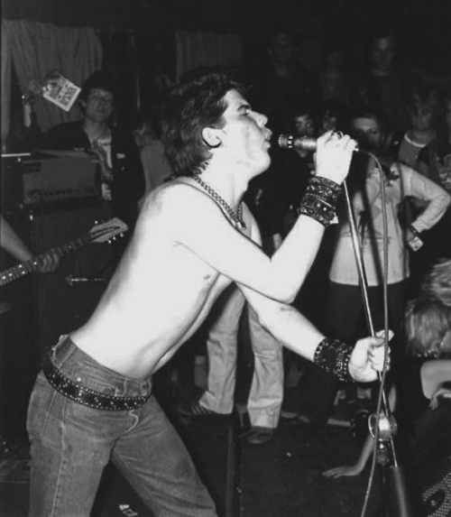 mainthreat: the germs / darby crash with keith morris (black flag) standing behind the bass amp.