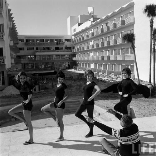 Miami showgirls rehearsing on the site of a new pool under construction(Robert W. Kelley. 1959?)