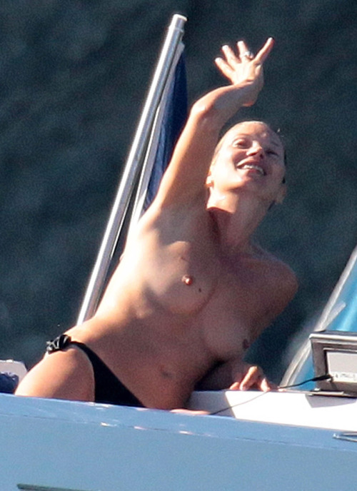 toplessbeachcelebs:  Kate Moss (Model) topless on a yacht in St. Tropez (August 2012) 