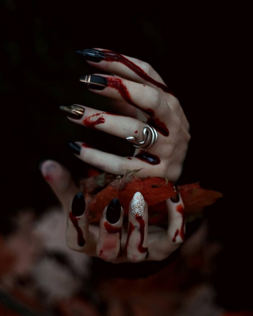 Natalieina:  Her Hands Were Covered With The Blood Of October.  Model - Kira Onuchina.