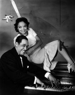 blackhistoryalbum:  Louie &amp; The Duke | Vintage Black Glamour \ 1930s Dancer and actress Louise Franklin strikes a pose with Duke Ellington for on the set of his musical, Jump!