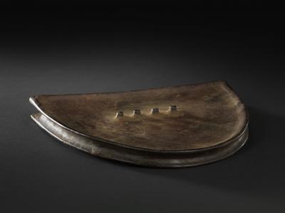 Wooden lip plate worn by women in the pierced lower lip. Typical custom of the Mursi and Suri in Eth