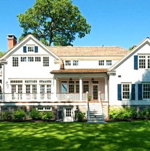 Vinyl - ExteriorInspiration For A Large Timeless White Two-story Vinyl Gable Roof Remodel