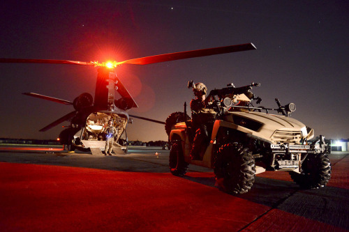 militaryarmament:  A U.S. Army Special Forces Lightweight All Terrain Vehicle being loaded onto a MH-47 Special Operations Chinook at McEntire Joint National Guard Base, S.C., May 20, 2014.