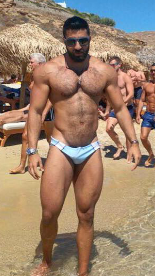 stratisxx:This hot Greek daddy was sporting a big bulge and furry pubes at Elia beach…