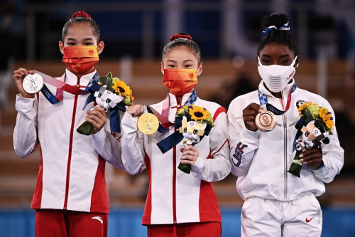 agathacrispies:Tang Xijing and Guan Chenchen of Team China and Simone Biles of Team USA during Women