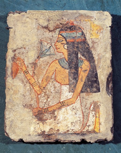 grandegyptianmuseum:Fragment of painting on lemon wood depicting woman at her toilet putting on some