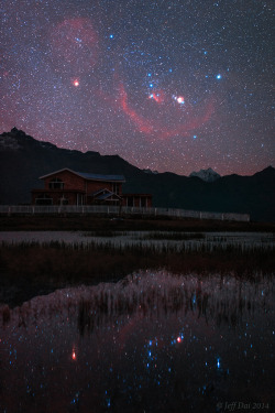 radivs:  Orion Rising over Tibet by Jeff DaiAs you know Orion always comes up sideways, But this single deep exposure brings out many sky wonders normally beyond human perception. The red circle all across the constellation Orion is Barnard's Loop. The