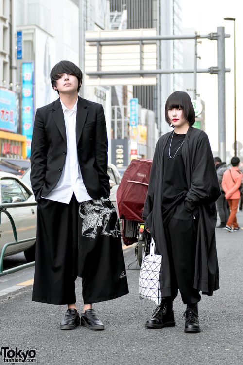 tokyo-fashion:  Japanese high school students Sato (18) and Mana (17) on the street in Harajuku wearing minimalist monochrome fashion by Yohji Yamamoto, Lad Musician, Issey Miyake Bao Bao, and Dr. Martens. Full Looks