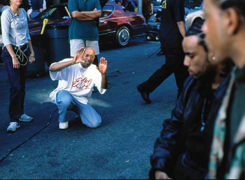 blackinmotionpictures: John Singleton behind the scenes of his films.