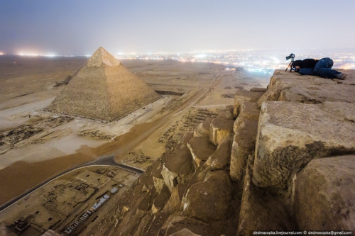 Cairo city lights seen from the top of Cheops Pyramid, Egypt (by Vadim Mahora).