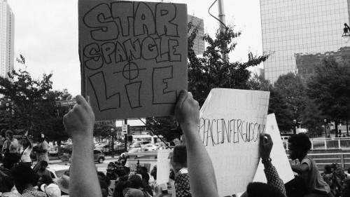 stephenphilms:  August 18th 2014 in Atlanta Georgia a peaceful Rally for the Justice of murdered unarmed teen Michael Brown took place. Michael Brown was shot 6 times in the street by a cop in Ferguson Missouri.  As the rain poured down a group of a