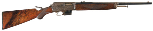 Factory engraved Winchester Model 1907 semi automatic rifle, early 20th century.