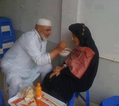 gharibafisabilillah:  70 years-old son feed his mother who is 101 years-old ^__^الإبن ذو السبعين عاماً يطعم والدته ذات ال 101 عام Your Lord has decreed that you worship none but Him alone, and treat parents with the