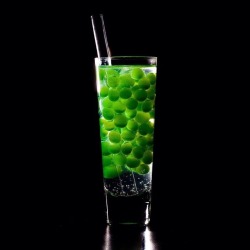 deelishrecipes:  Molecular gastronomy cocktail version of gin and tonic made with cucumber juice spherified with sodium alginate. by ChristianSeel http://500px.com/photo/96082843
