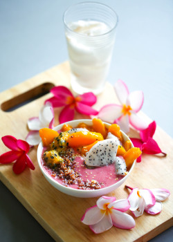 redefiningfood:  The most beautiful breakfast: Strawberry/Raspberry Banana Smoothie bowl with Mango, Dragonfruit and Passionfruit topped with Red Quinoa and White Sesame Seeds, and a glass of fresh Coconut Juice. I was looking for a little detox breakfast