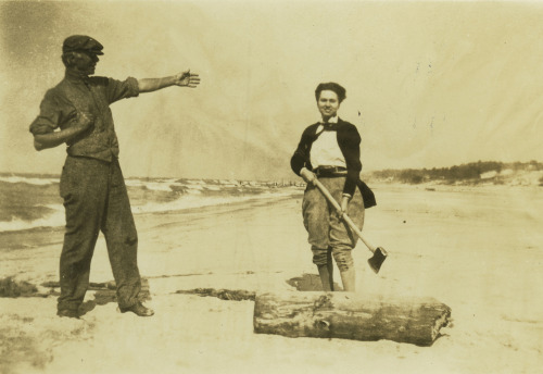 composersdoingnormalshit:Ruth Crawford Seeger chopping wood on a beach with Carl Sandburg. 