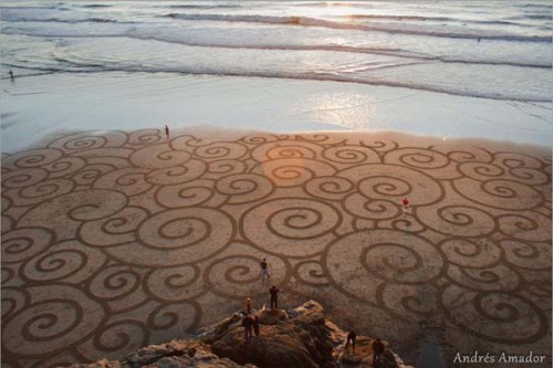 A Man Takes A Single Rake To The Beach. And When You Zoom Out And See It… Mind BLOWN.