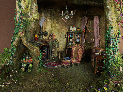 valerie-jeanne:Fairy house built in the base of a tree.