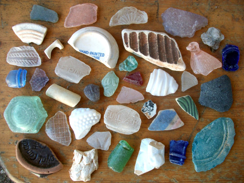 shadyufo:Some words and neat textures and colors on tumbled glass and pottery from the creek. A coup