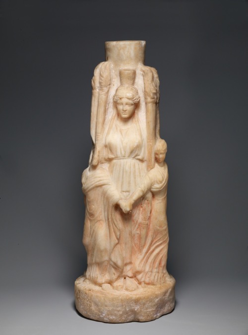 via-appia:Marble statuette of triple-bodied Hekate and the three Graces. Hekate presided over pathwa
