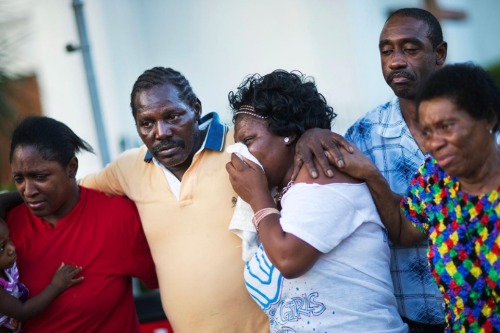 aljazeeraamerica:  Photos: Mourning victims of Charleston shootings Grief and memorials for nine killed in South CarolinaFor more information on the #CharlestonShooting: http://alj.am/kvau