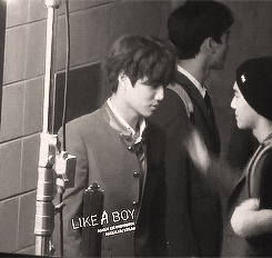 jonginnies:  Kai happily playing with the drinking fountainn until bad boy Suho arrives