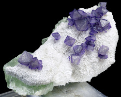 bijoux-et-mineraux:  Fluorite and Quartz -  De`an fluorite mine, Jiujiang Prefecture, Jiangxi Province, China  