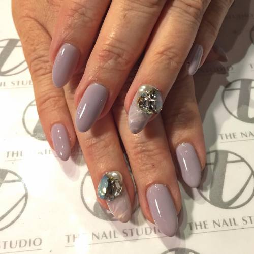 Lavender gray, subtle marble and a “little bling”. #TheNailStudiobyTO #nailart #naildesi