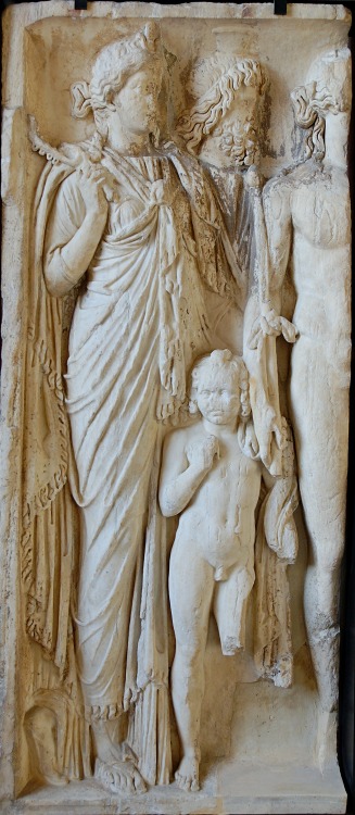 arjuna-vallabha:Isis, Serapis and Harpocrates, roman relief