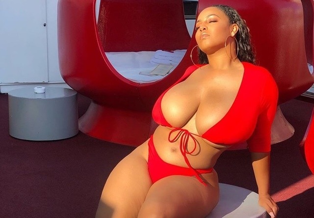 thebiggestever:Just pull one little string and her huge tits are free.