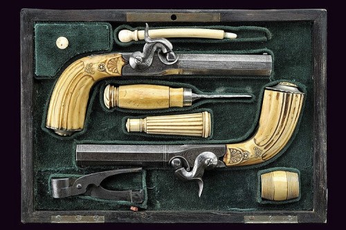 Cased pair of ivory handled percussion pocket pistols, originates from Belgium, mid 19th century.