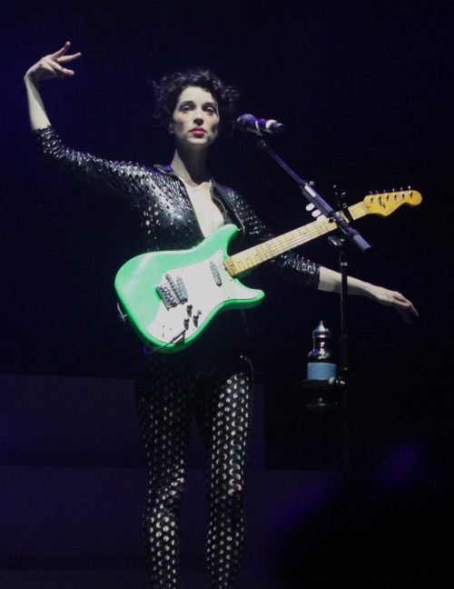 St. Vincent calmly flashing the rockgang sign for “With this I slayed thee.”at XPoNential Music Fest
