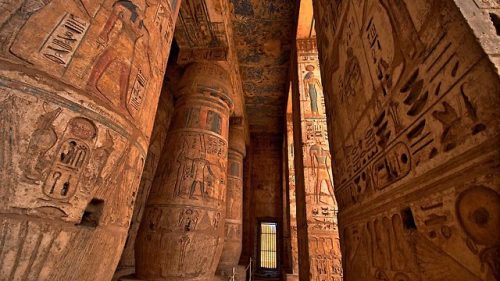Medinet Habu Detail of pillars and columns carved with figures and hieroglyphs. The Mortuary temple 