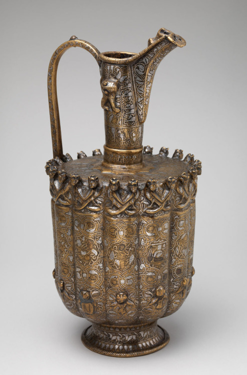 marylibra:Ewerca. 1180–1210Iran or AfghanistanBrass; raised, repoussé, inlaid with silver and a blac