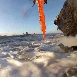 onlylolgifs:  Lava spilling into the ocean  something about is feels so calming