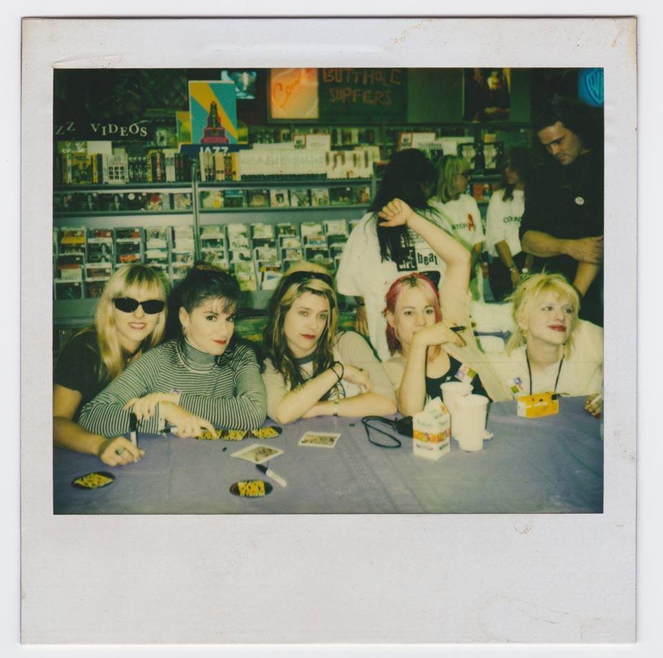 auraofhorror-deactivated2020083:  Polaroid of L7 with Courtney Love showing support-