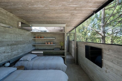 33diors: a minimalistic structure consisting mostly of exposed concrete and built by Luciano Kruk.