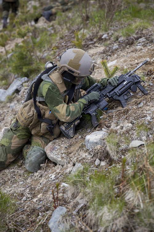 militaryarmament:  Recruits with The Norwegian Army’s Manoeuvre School’s Mechanized Company Group (KESK) during a live fire exercise at Rena Military Base. June 4, 2015.