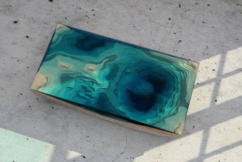 mymodernmet:The Abyss Table is a stunning coffee table that mimics the depths of the ocean with stac