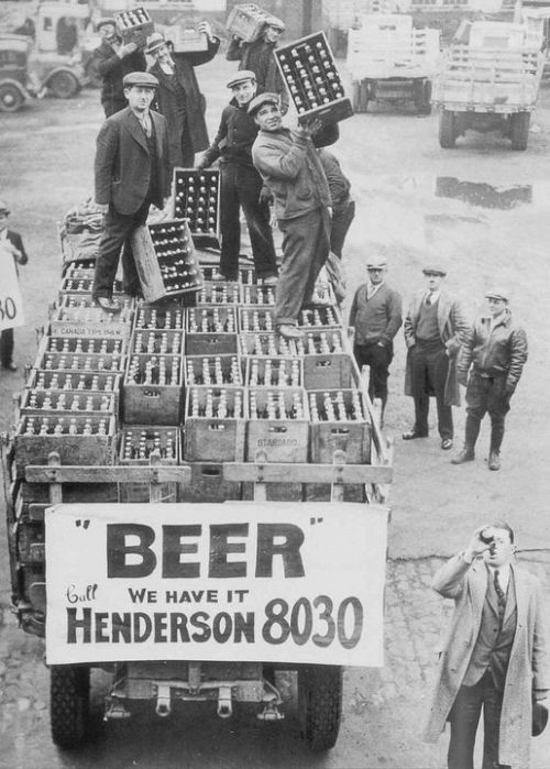 Man takes a deep gulp of beer with the end of Prohibition in 1933. Nudes &amp; Noises  