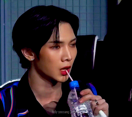 holy-yeosang:27 frame gif of Yeosang sipping water prettily.