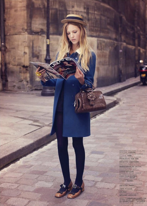 Ella Richards reading Jolouse.Anna Querouil styles Richards as a perfectly-dressed young Parisian la