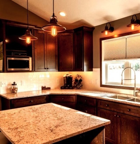 Minneapolis Rustic KitchenInspiration For A Large Rustic U-shaped Dark Wood Floor And Brown Floor Enclosed
