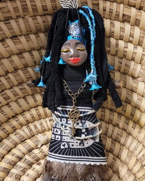 This is a Louisiana Broom doll. In Louisiana, the broom is a symbol of health and fertility. It also